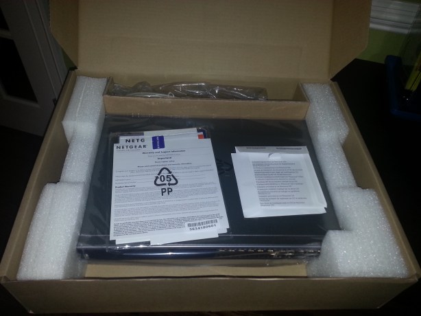 Plain brown box reveals interesting plastic wrapped goodness!